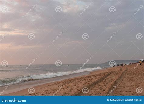 A Sand Trail of a Car in a Beach with Waves Stock Photo - Image of ...