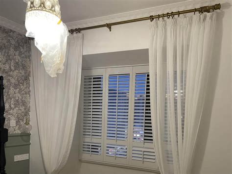 How to Pair Plantation Shutters with Curtains?