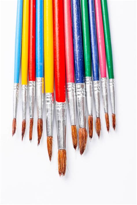 Multi-colored paint brushes on white background (Flip 2019) - Creative Commons Bilder