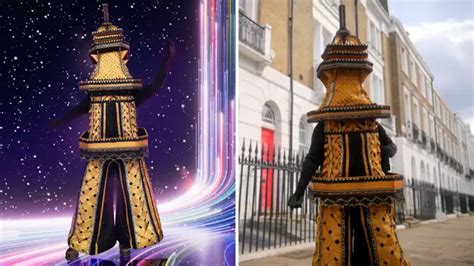 Who is Eiffel Tower on The Masked Singer? All clues and guesses revealed - Heart
