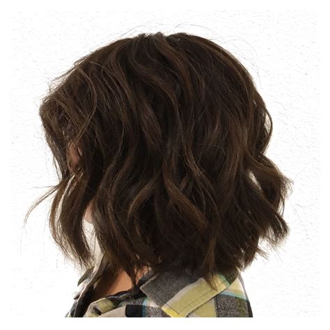 All over dark brown color brunette short haircut lob waves | Short dark ...