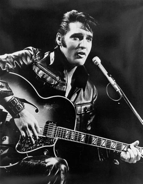 Download Elvis Presley Playing Guitar Black And White Wallpaper | Wallpapers.com