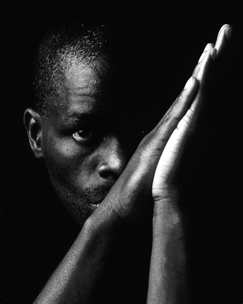 Black Man with Praying Hands Photograph by Martin Sullivan