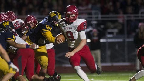 The top regional final in each Michigan high school football division