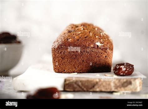 Homemade healthy date nut bread loaf, selective focus Stock Photo - Alamy