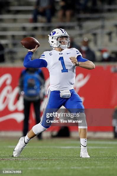 Zach Wilson of the BYU Cougars looks to pass in the first half... News ...