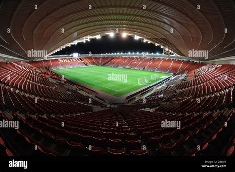 View inside St. Mary's Stadium at night under floodlights, home of Southampton Football Club ...