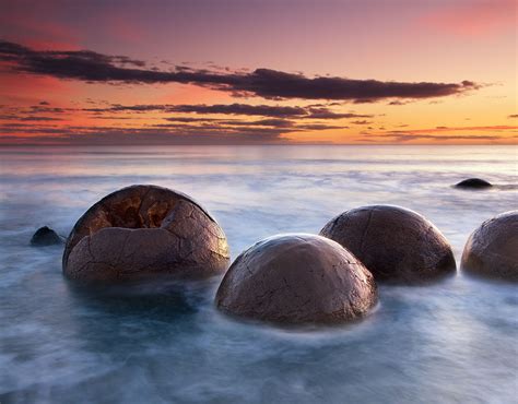 Koekohe Beach, New Zealand. The Moeraki Boulders (dragon eggs) are unusually large and spherical ...