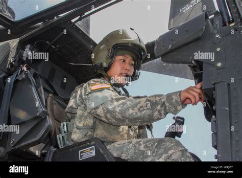 First Lt. Sarah Jeon, an AH-64 Apache helicopter pilot from the 4th Aerial Reconnaissance ...