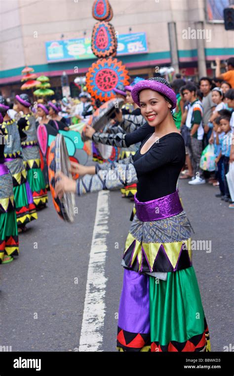 woman with sinulog costume in the sinulog parade Stock Photo - Alamy