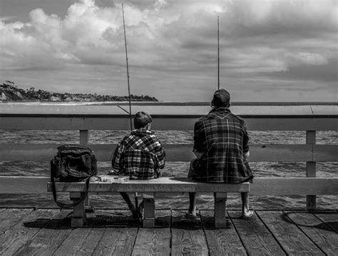 I captured this father and son fishing on the Oceanside Pier. - Wine Country