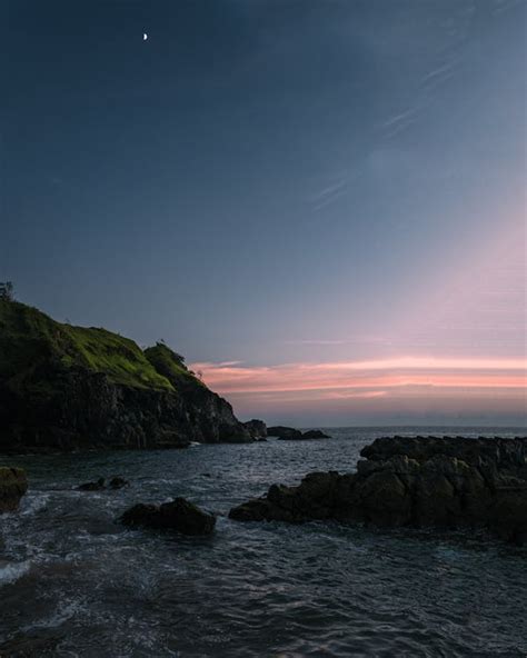 Rocks on the Ocean during Sunset · Free Stock Photo