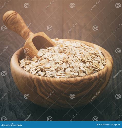 Oat Flakes in Wood Bowl on Oak Table Stock Image - Image of measuring ...