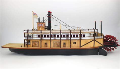 Lot - Wooden scale model of a paddle wheeler. 38 in. (96.5 cm) l.