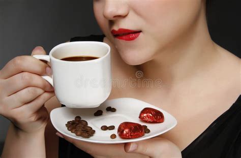 Woman Holding a Cup of Coffee Stock Photo - Image of grind, beverage: 20206168