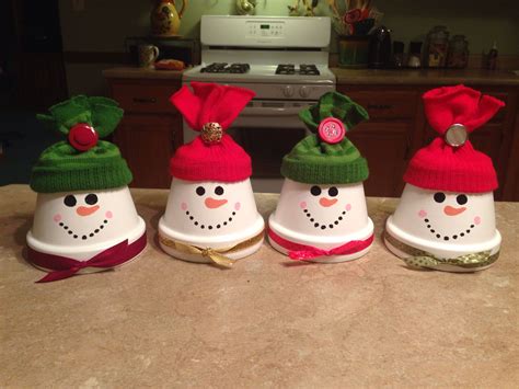 Snowmen made from small terra-cotta pots!