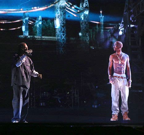 Tupac Hologram "Performs" With Snoop Dogg at Coachella | Us Weekly | Tupac, Snoop dogg ...