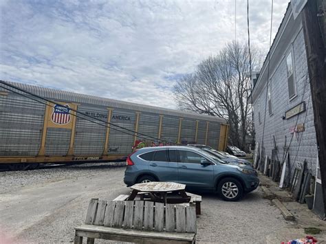 Twenty-one rail cars derailed as CSX crew tried to avoid a semi truck on the tracks