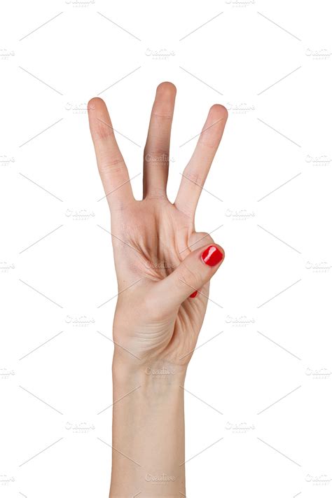 Female hand showing three fingers ~ People Photos ~ Creative Market