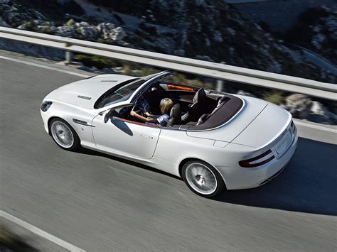 Woman driving a white Aston Martin coupe convertible during daytime HD ...