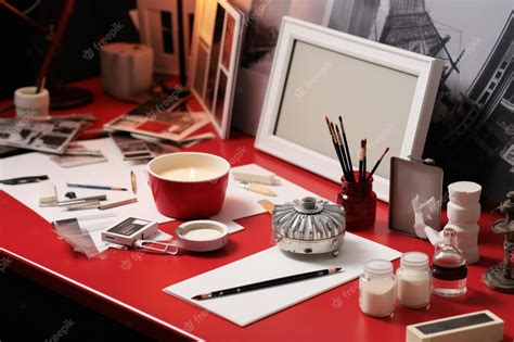 Premium Photo | An empty film board on red background with movie snacks ...