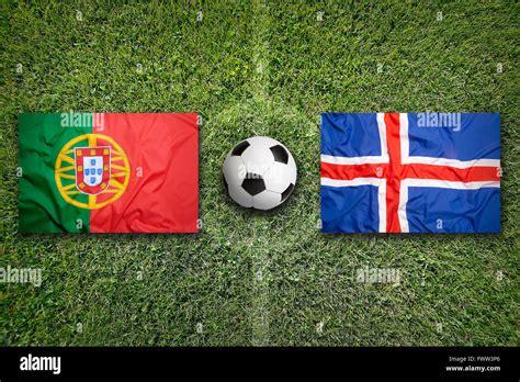 Portugal vs. Iceland flags on green soccer field Stock Photo - Alamy