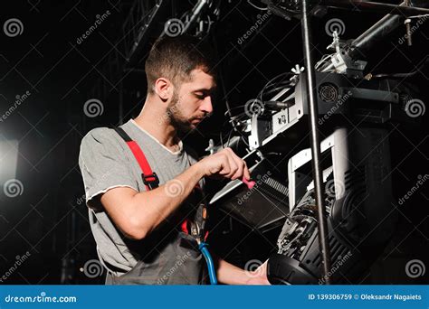 The Lighting Engineer Adjusts the Lights on Stage. Stock Image - Image of event, engineering ...