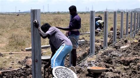 Erecting a concrete fencing posts | Concrete fence, Concrete fence ...