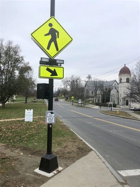 Town installs new pedestrian crossing lights, signs along Main Street ...