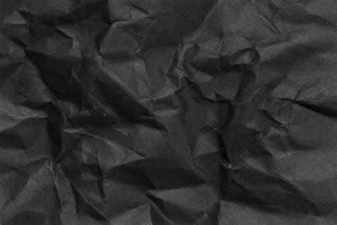Crumpled black paper texture 1227303 Stock Photo at Vecteezy