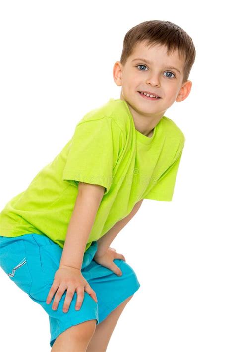 Smiling Boy Holding Hands on His Knees Stock Image - Image of preschool, multi: 52298661