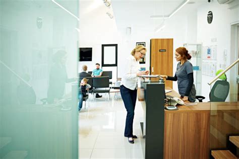 Medical Receptionist Uniforms Stock Photos, Pictures & Royalty-Free ...