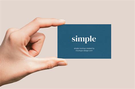 Hand holding business card mockup - Mockups Design