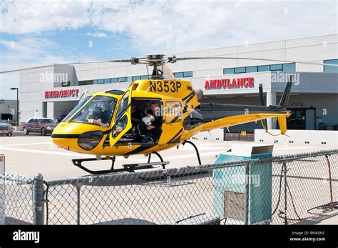 A medical evacuation helicopter sits on a pad at a regional medical ...