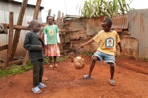 Playing football | African children, Children photography, African