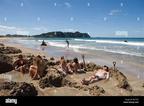 Relaxing in Thermal Pools, Hot Water Beach, Coromandel Peninsula, North Island, New Zealand ...