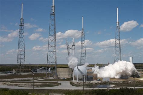 Spaceflight Now | Falcon Launch Report | Falcon 9 lights main engines on launch pad