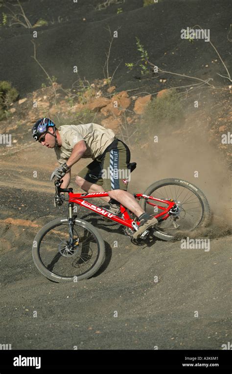 A Mountain Biker riding in a Rugged Landscape Stock Photo - Alamy