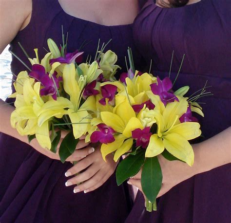 Wedding By Designs: Purple and Yellow Bouquets