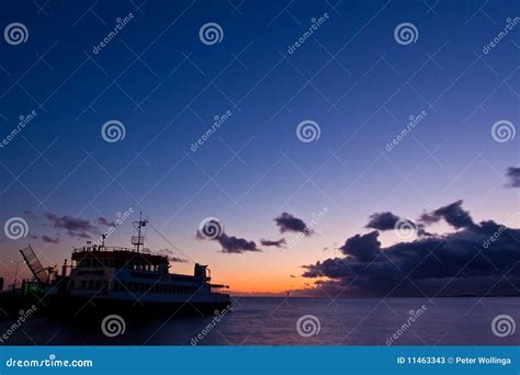 Sunset at Sea with a Ferry Boat in the Harbour Stock Image - Image of ...