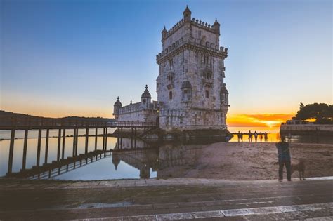 Premium Photo | Belem tower at sunset in lisbon