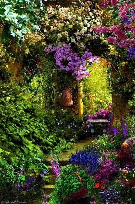 Colorful garden leading to an arched doorway | Beautiful gardens, Dream ...