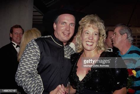 Garth Brooks and wife Sandy Mahl in the press room of the 27th Annual ...