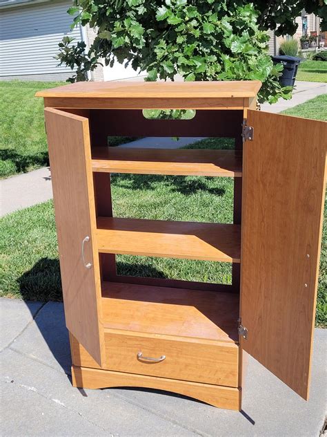 Free cabinet with drawer and shelves. - Ashley Heights