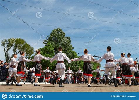 People Dance and Have Fun in National Authentic Costumes. Parade of the ...