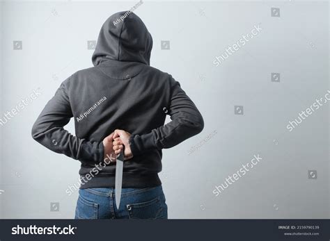 Rear View Mysterious Man Holding Knife Stock Photo 2159790139 ...