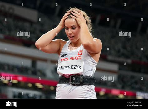 Maria Andrejczyk, of Poland, reacts after winning the silver medal in ...