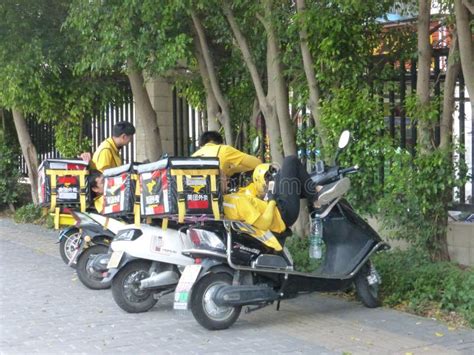 Shenzhen, China: Street Couriers Deliver Food or Wait for a Break ...