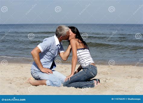 Couple Kissing On The Beach Royalty Free Stock Images - Image: 11076639