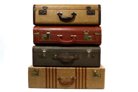 RESERVED Set of Four Stackable Vintage Suitcases